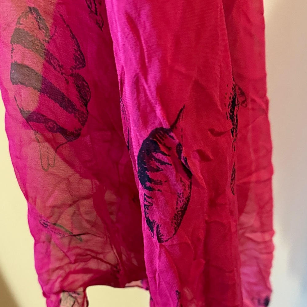 Vibrant Pink Scarf with Black Patterns